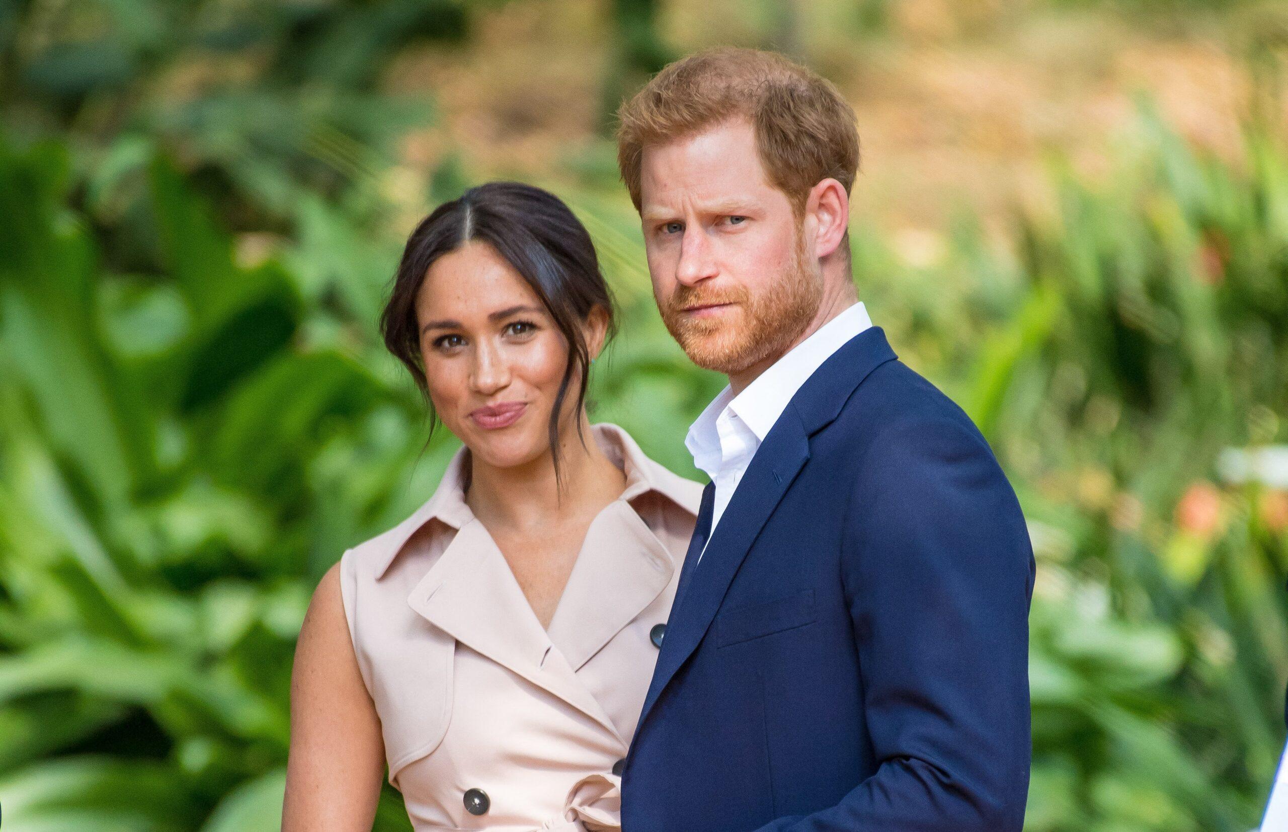 Prince Harry and Meghan Markle posing