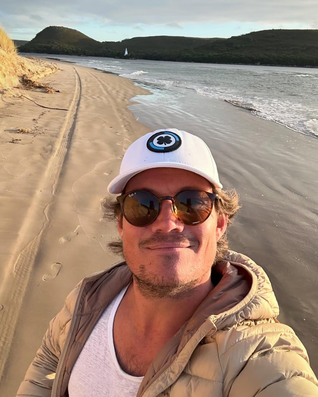 Gary King poses on the beach.