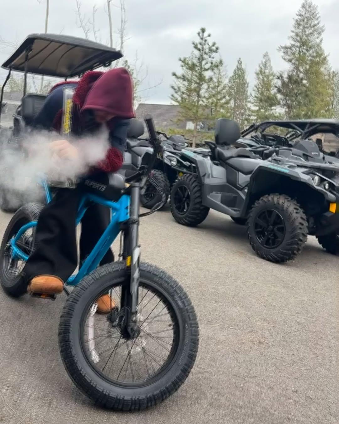 Justin Bieber smokes Bong on a bike in new photos