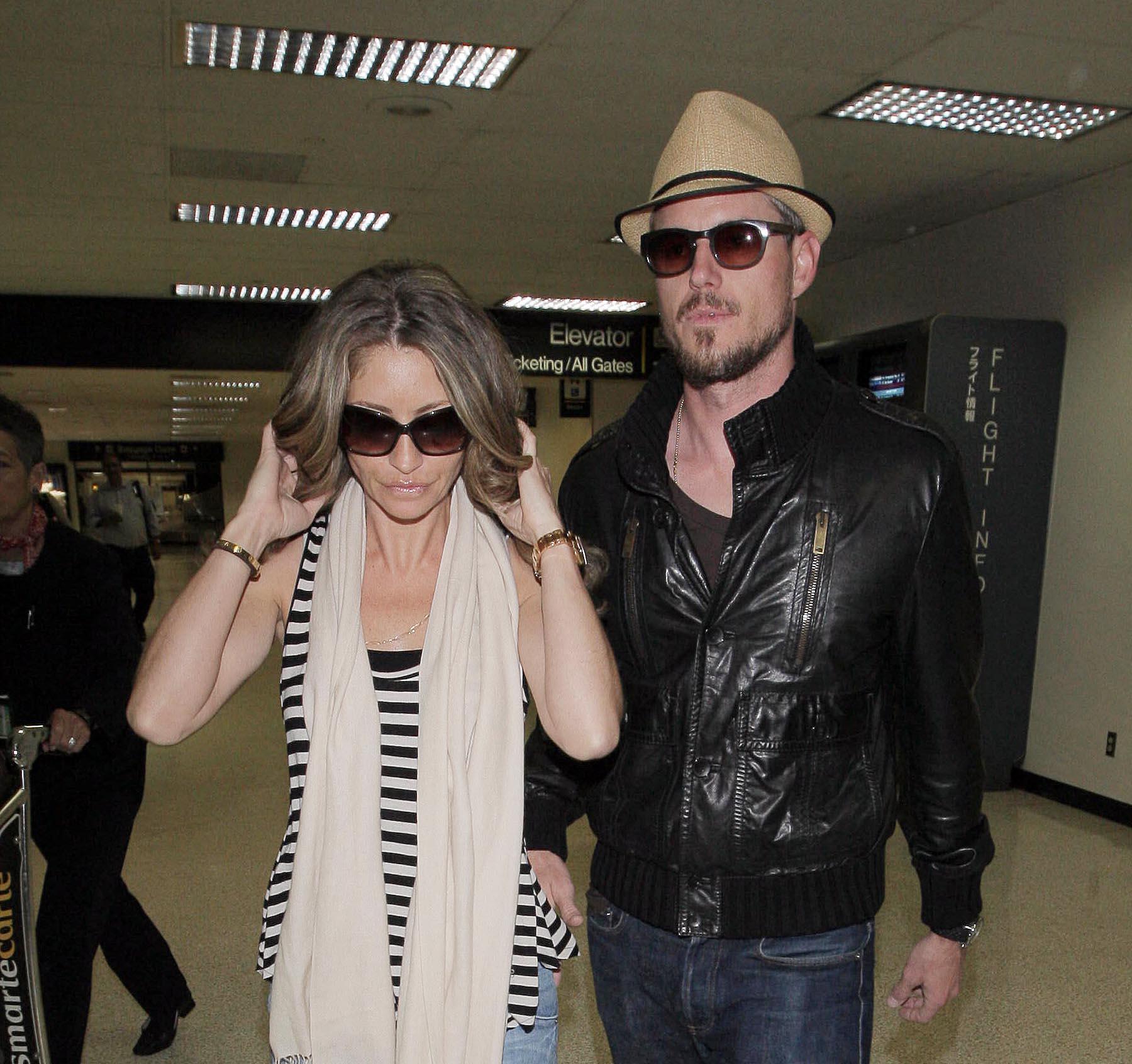 ERIC DANE AND WIFE REBECCA GAYHEART AT LAX