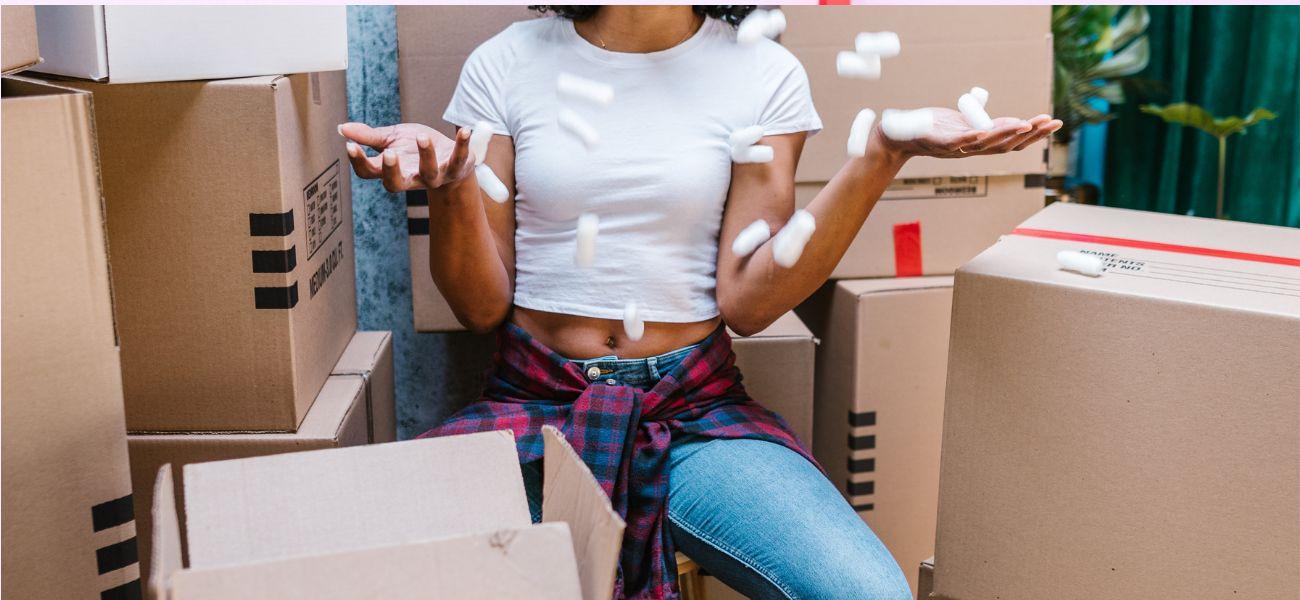 Girl throwing packing peanuts