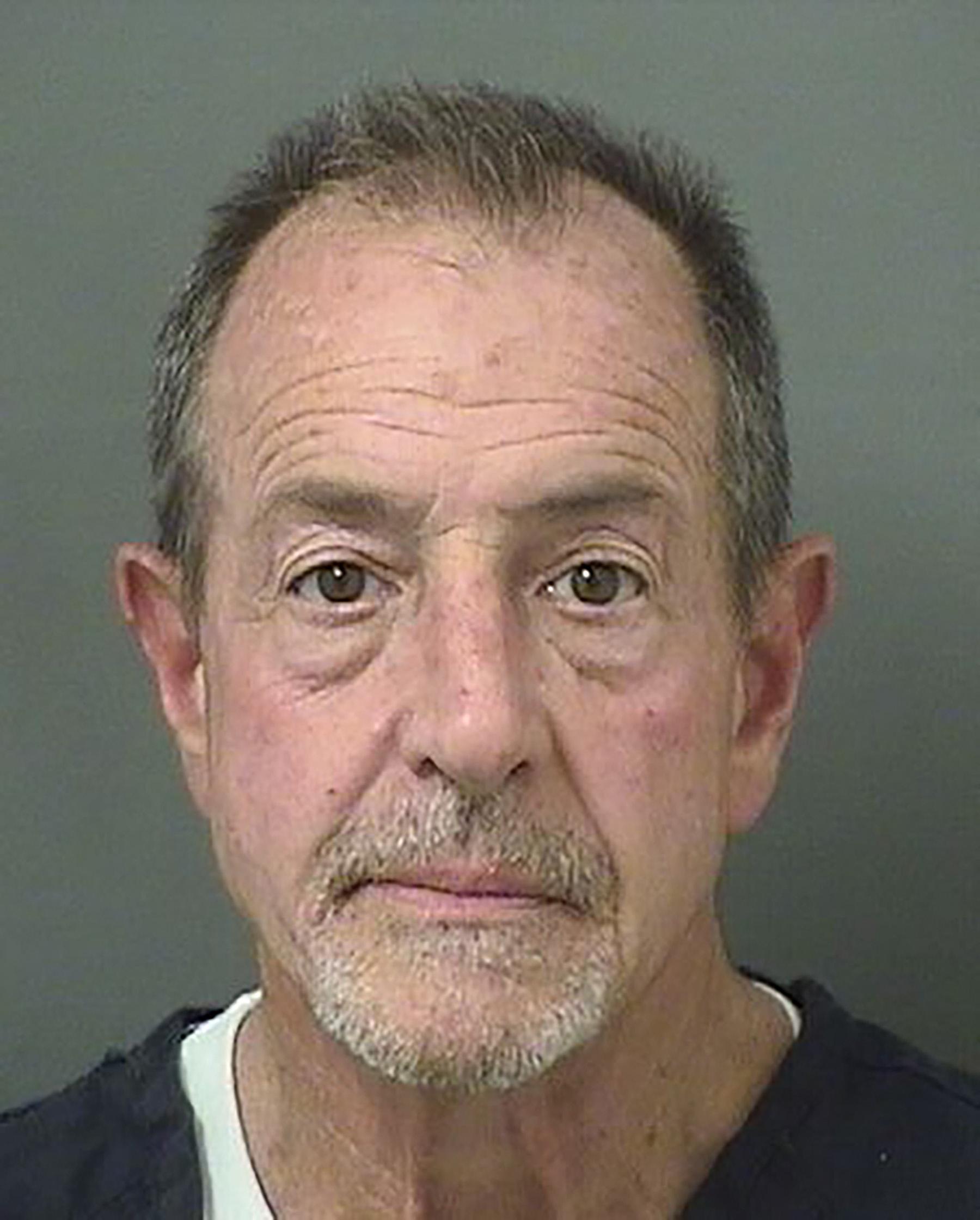 Michael Lohan is back behind bars for probation violation in Florida - see his latest mugshot.