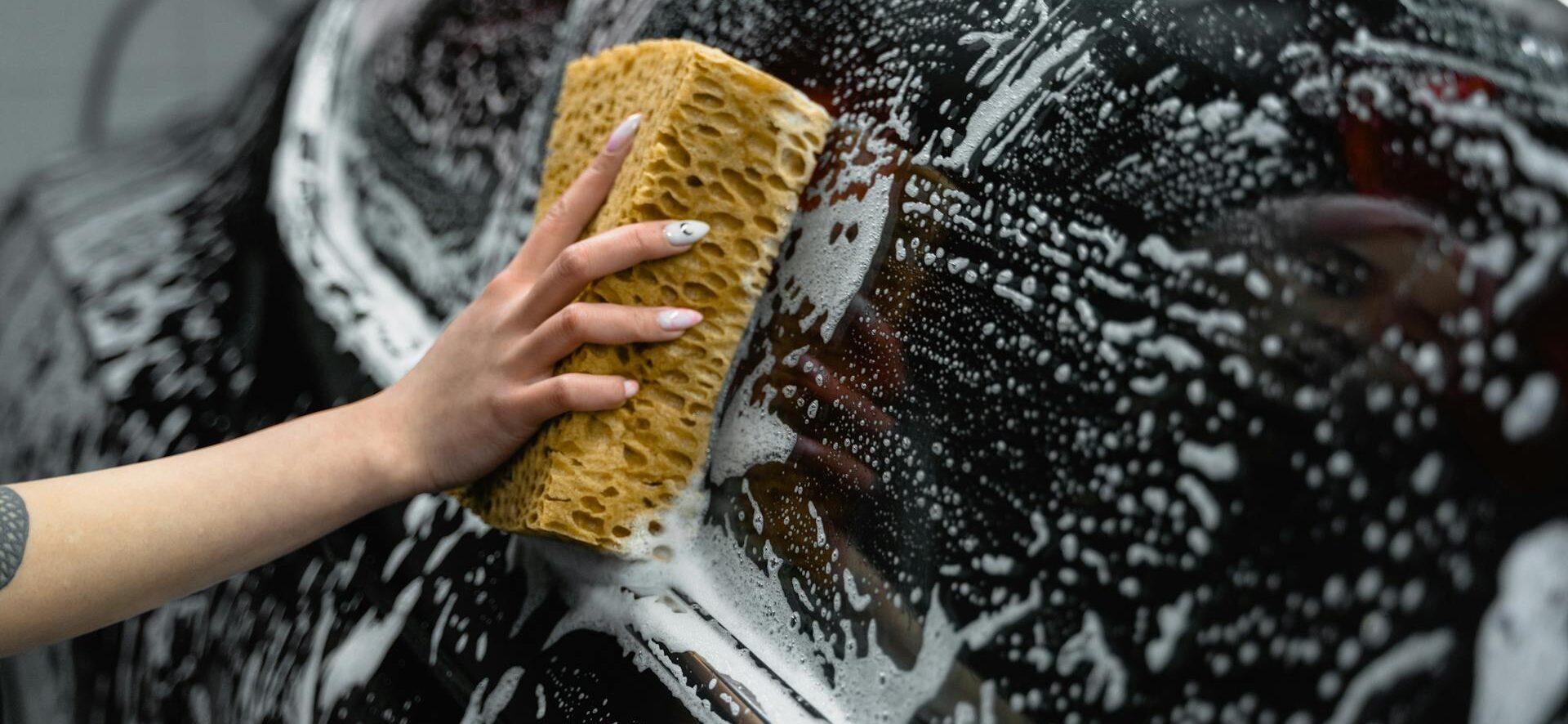 A person washing a car