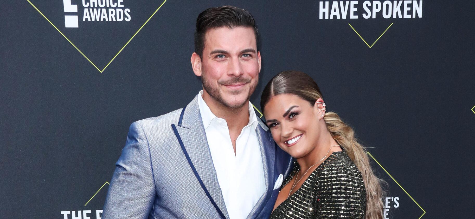 Brittany Cartwright posing with Jax Taylor.