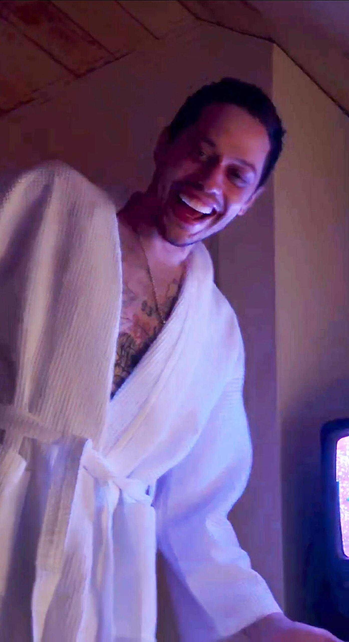 Pete Davidson in a bathrobe