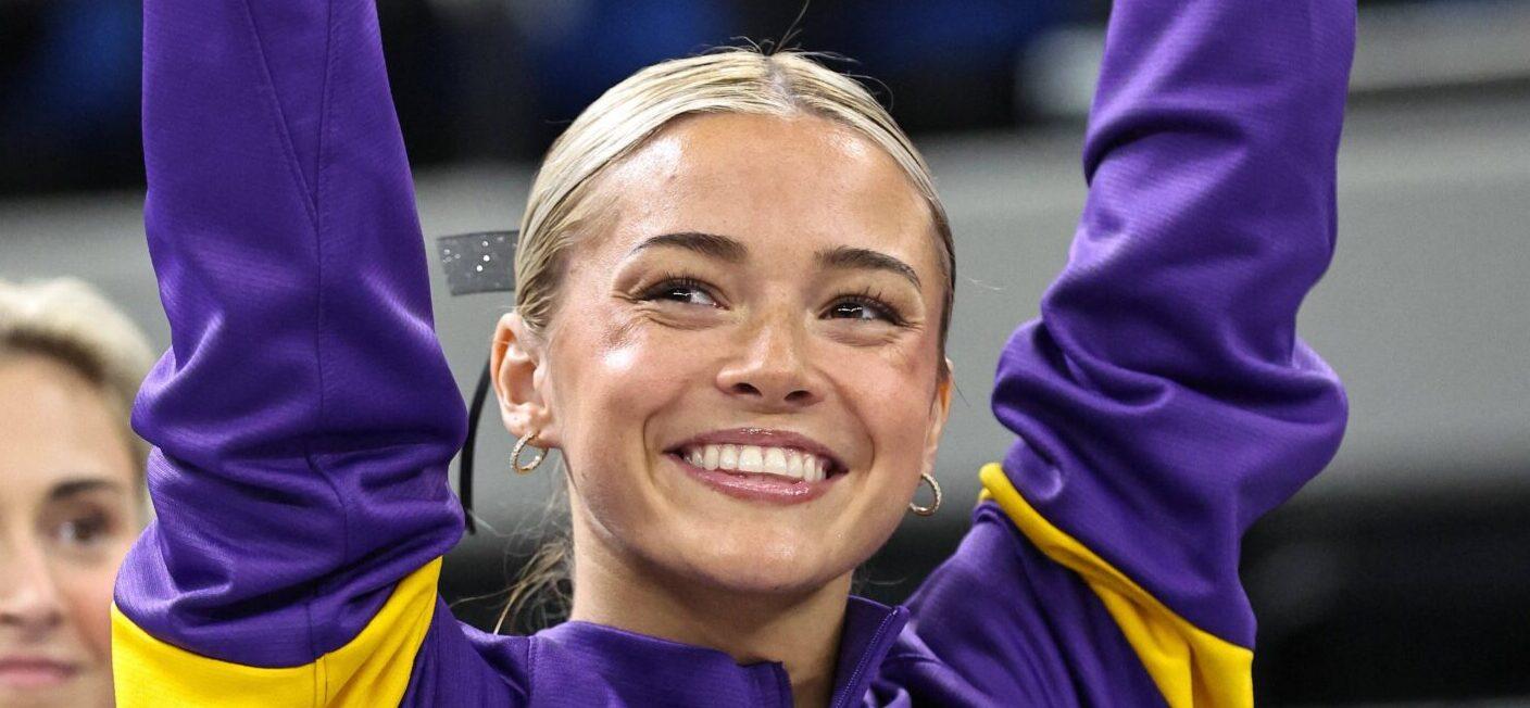 February 28, 2025: LSU's Aleah Finnegan competes on the balance beam during the Purple and Gold Podium Challenge woman's gymnastics LSU vs George Washington at the Raising Canes River Center in Baton Rouge, LA. Jonathan Mailhes/CSM. 28 Feb 2025 Pictured: February 28, 2025: LSU's Olivia Dunne is introduced to the audience prior to the Purple and Gold Podium Challenge woman's gymnastics LSU vs George Washington at the Raising Canes River Center in Baton Rouge, LA. Jonathan Mailhes/CSM. Photo credit: ZUMAPRESS.com / MEGA TheMegaAgency.com sales@mega.global (Mega Agency TagID: MEGA1276490_006.jpg) [Photo via Mega Agency]