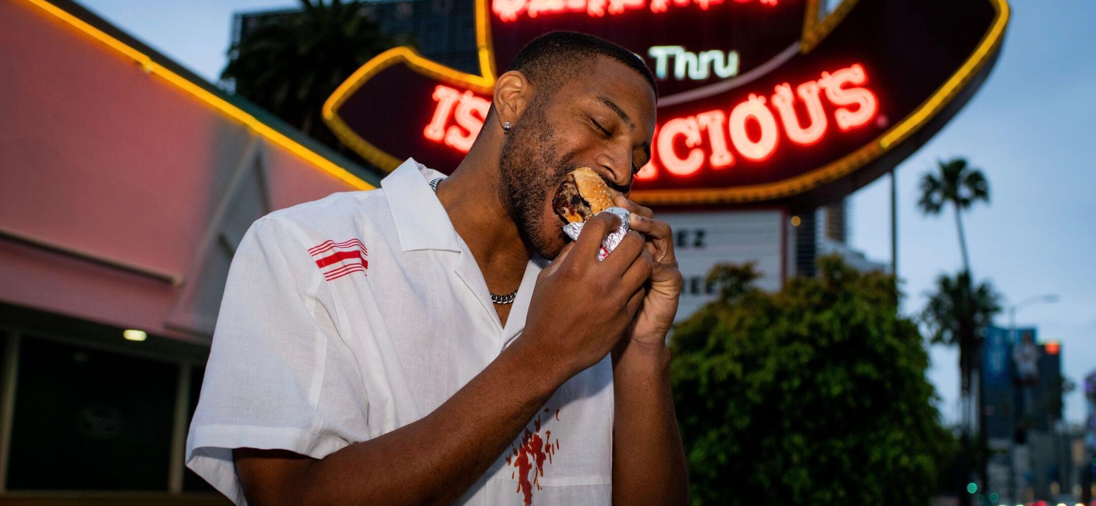 Man eating Arby's sandwich