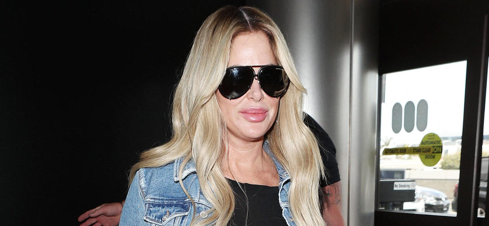Kim Zolciak arrives at the Los Angeles International Airport. 11 Mar 2018 Pictured: Kim Zolciak. Photo credit: MEGA TheMegaAgency.com +1 888 505 6342 (Mega Agency TagID: MEGA181370_020.jpg) [Photo via Mega Agency]