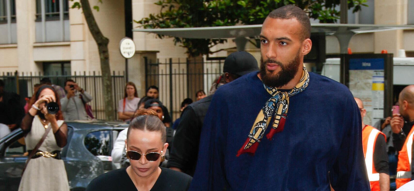 Rudy Gobert and Julia Bonilla attending Hermes show during Paris Fashion Week.