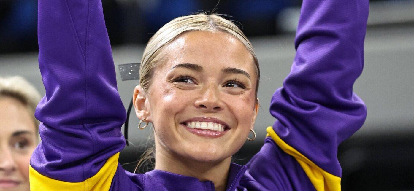 February 28, 2025: LSU's Olivia Dunne competes on the balance beam during the Purple and Gold Podium Challenge woman's gymnastics LSU vs George Washington at the Raising Canes River Center in Baton Rouge, LA. Jonathan Mailhes/CSM. 28 Feb 2025 Pictured: February 28, 2025: LSU's Olivia Dunne is introduced to the audience prior to the Purple and Gold Podium Challenge woman's gymnastics LSU vs George Washington at the Raising Canes River Center in Baton Rouge, LA. Jonathan Mailhes/CSM. Photo credit: ZUMAPRESS.com / MEGA TheMegaAgency.com sales@mega.global (Mega Agency TagID: MEGA1276490_006.jpg) [Photo via Mega Agency]