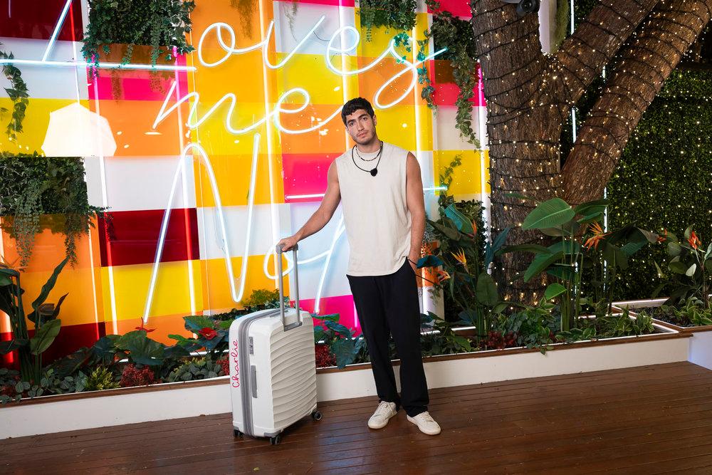 "Love Island" contestant Charlie leaving the villa.