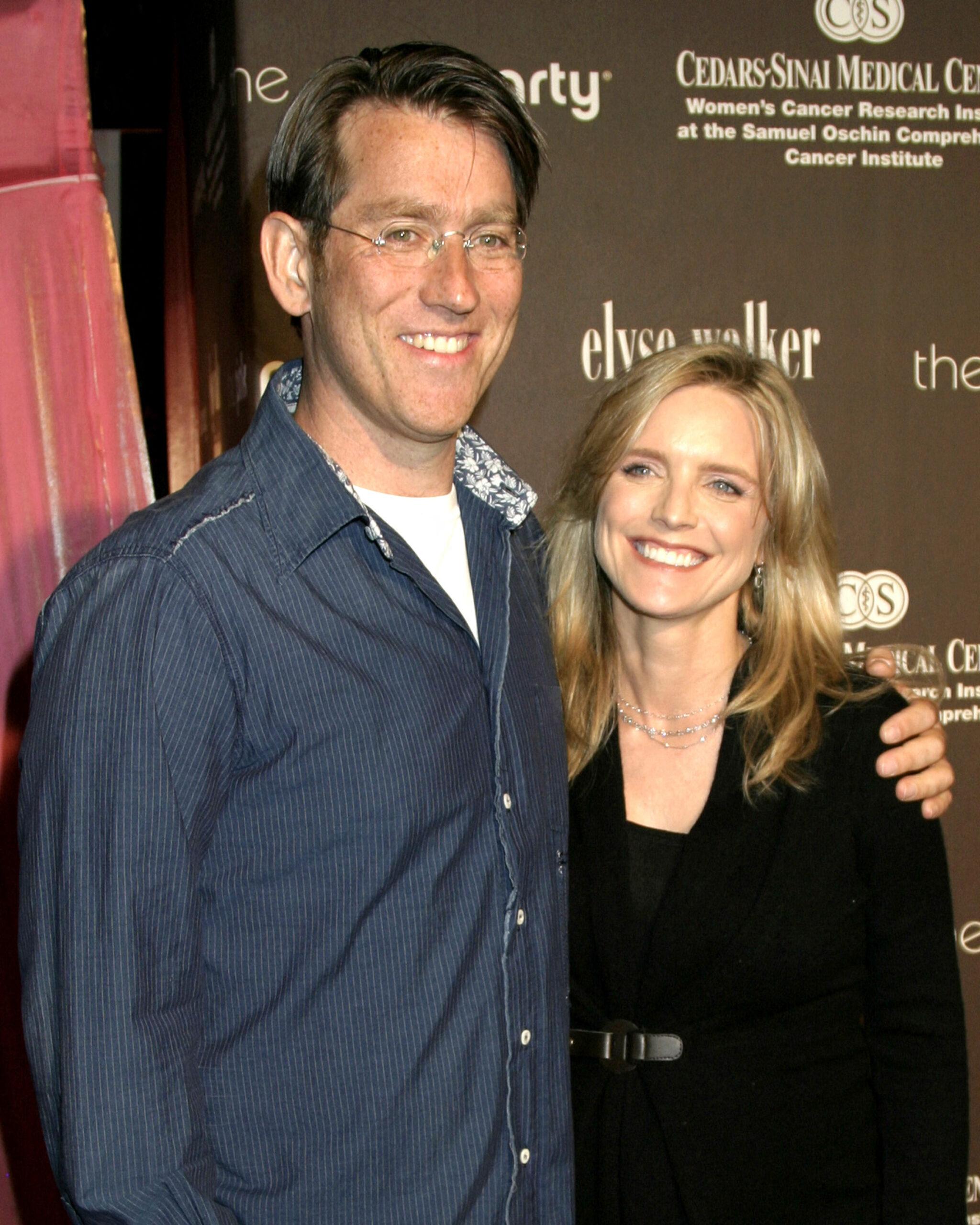 Courtney Thorne-Smith and Roger Fishman