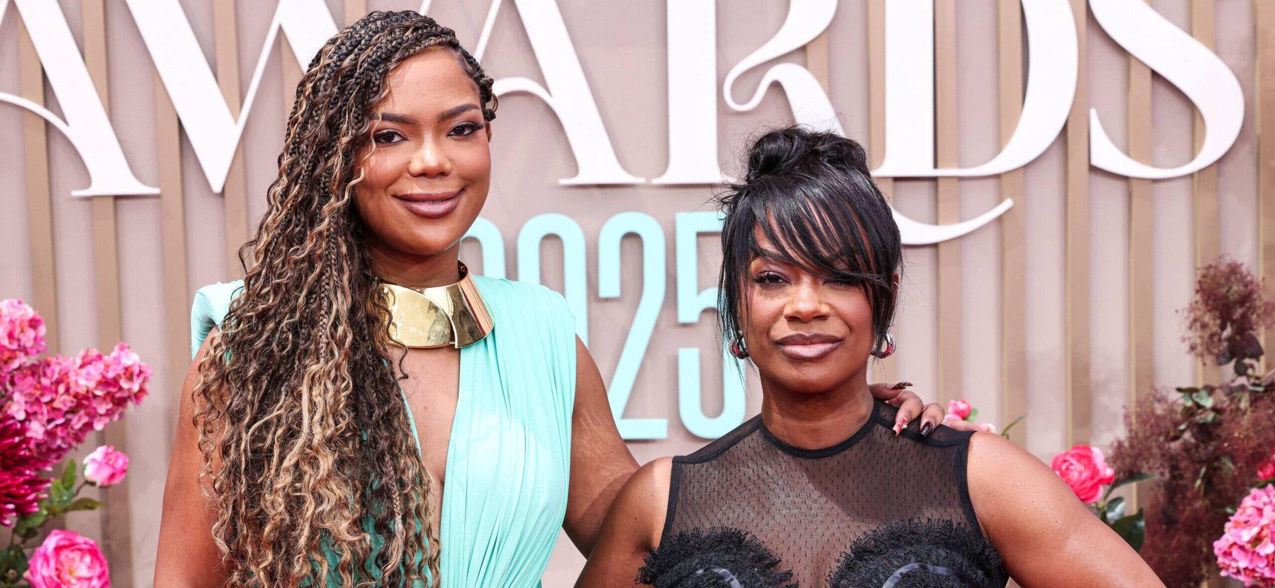 Riley and Kandi Burruss posing on the red carpet at the BET Awards.