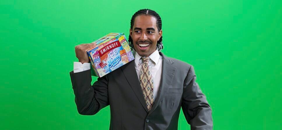Boman Martinez-Reid holding a box Smirnoff ICE