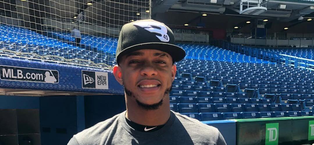 Ketel Marte posing in a baseball stadium.