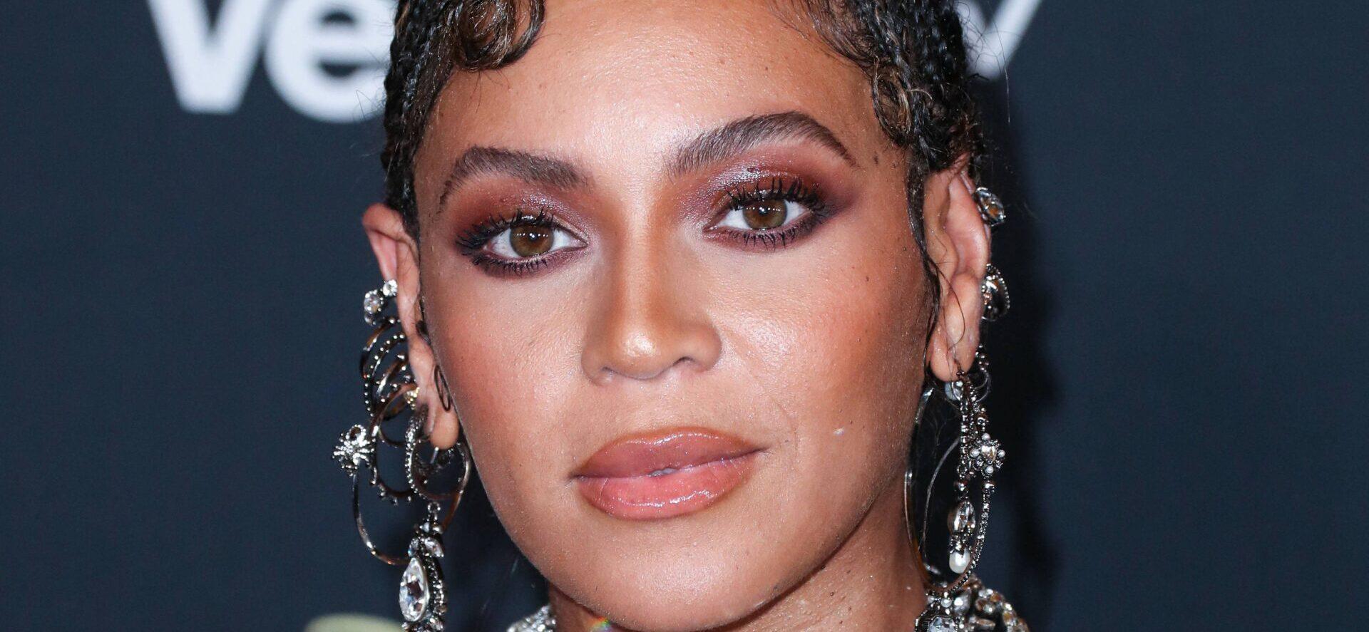 Beyonce Knowles Carter wearing an outfit by Alexander McQueen and Lorraine Schwartz jewelry arrives at the World Premiere Of Disney's 'The Lion King'