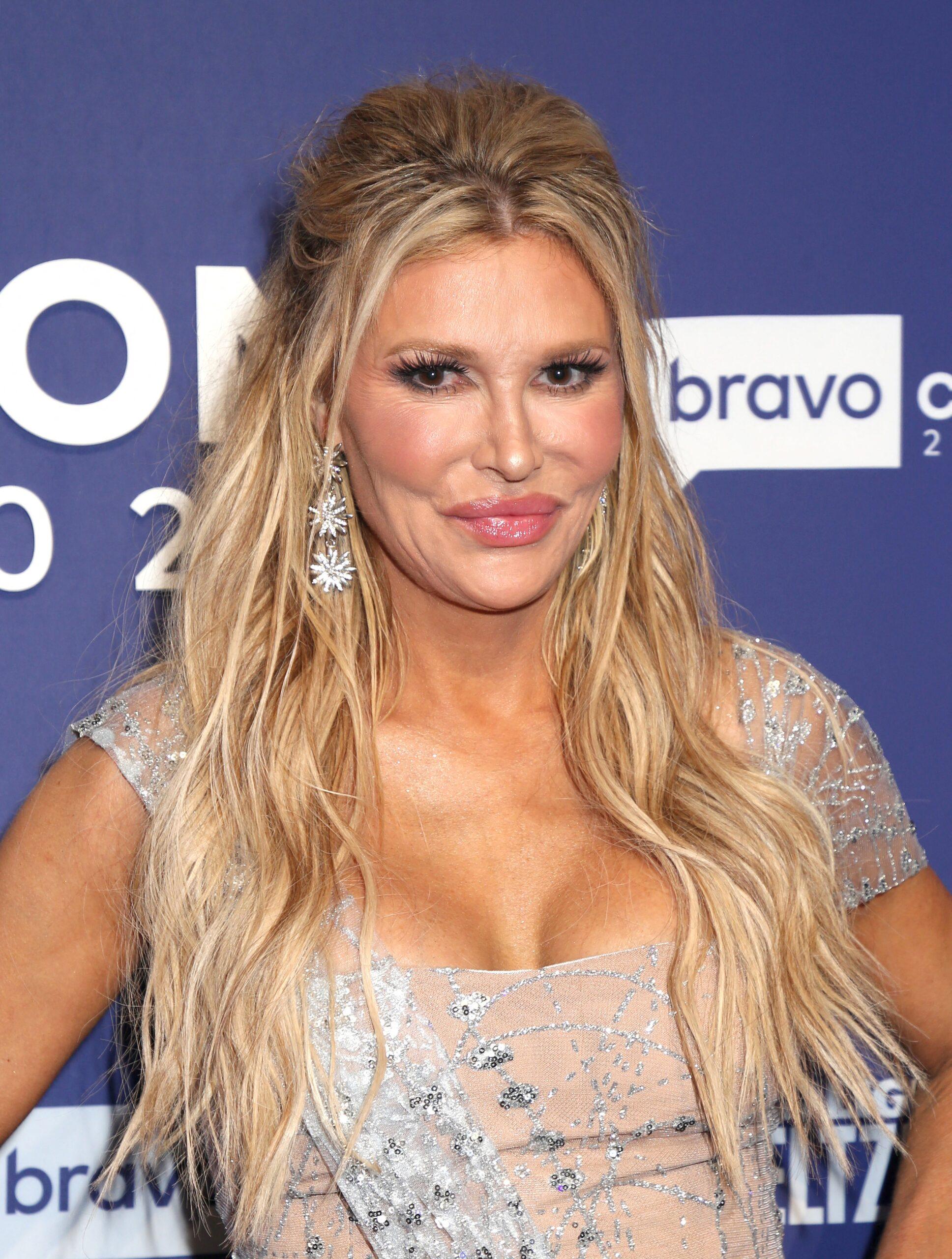 Brandi Glansville in the Andy Leeschian Red Rug in Bravocon