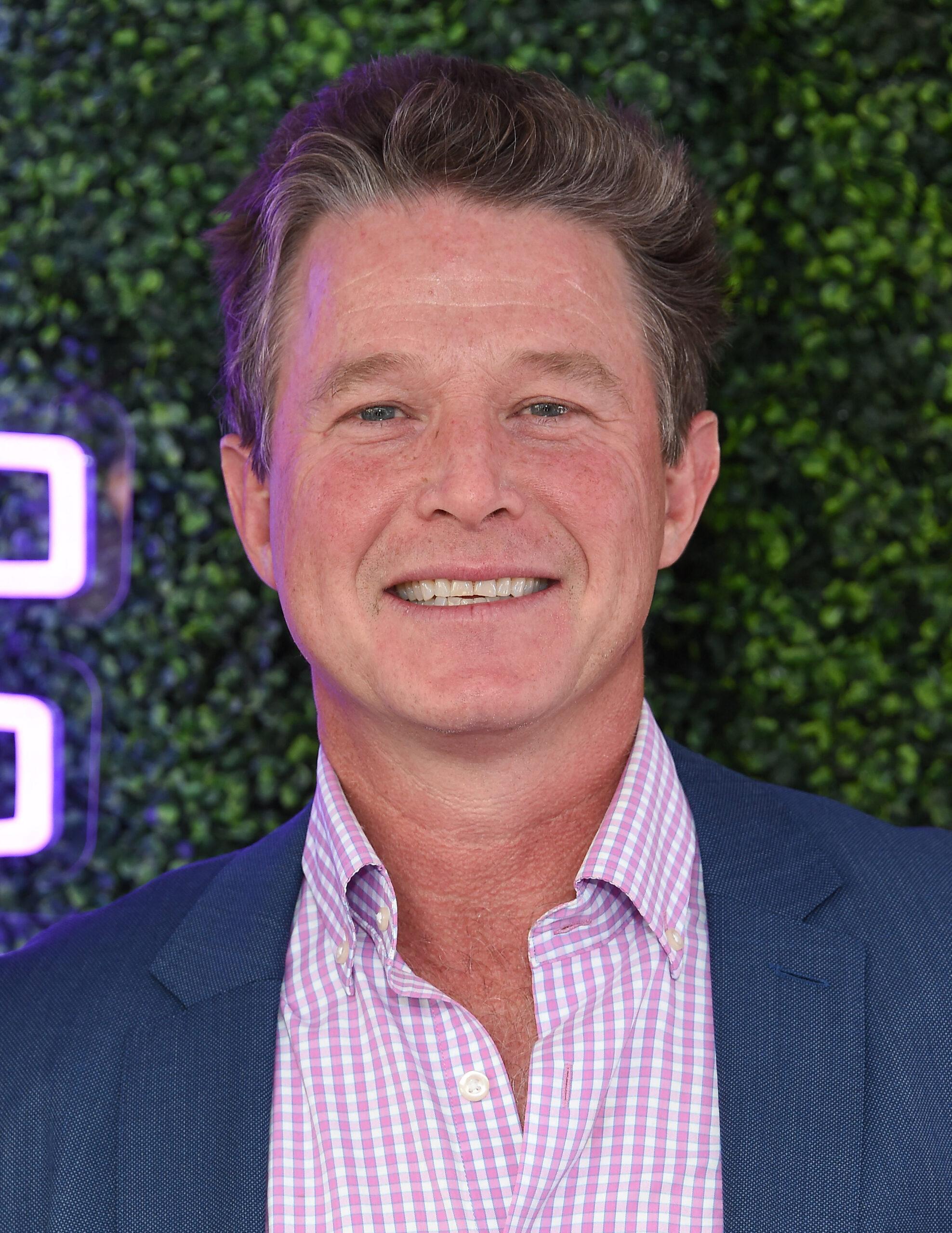 Billy Bush posing for the camera.
