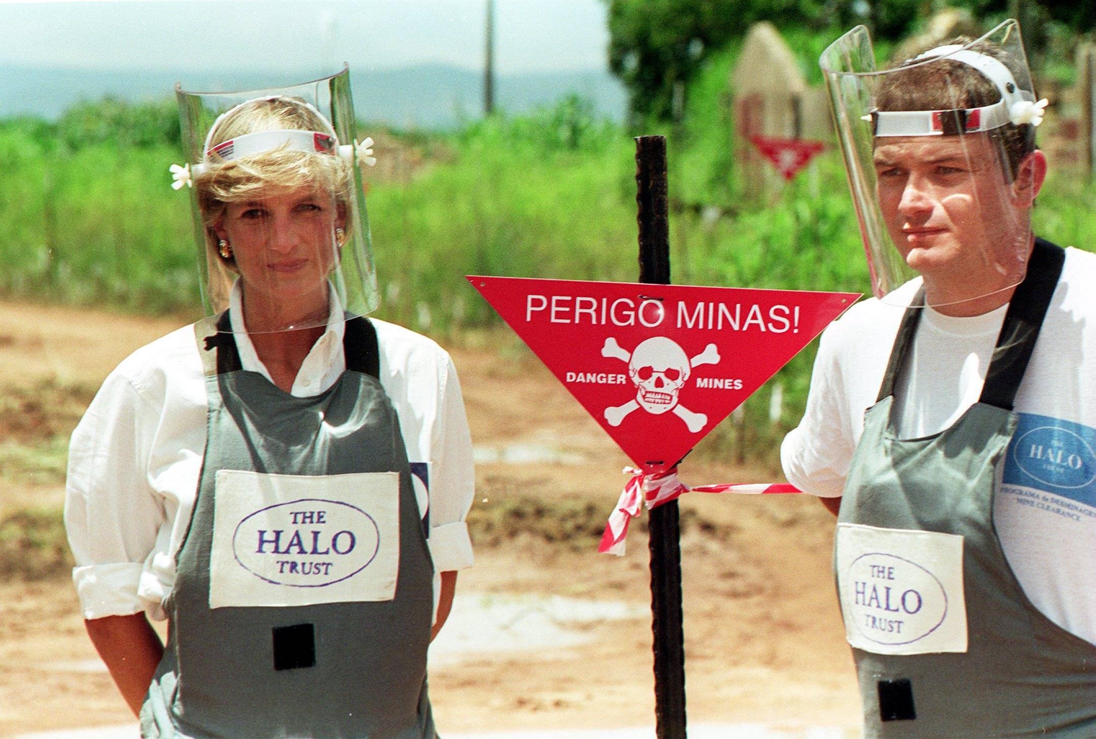 Princess Diana with Halo Trust landmine worker Paul Heslop in Angola minefield.