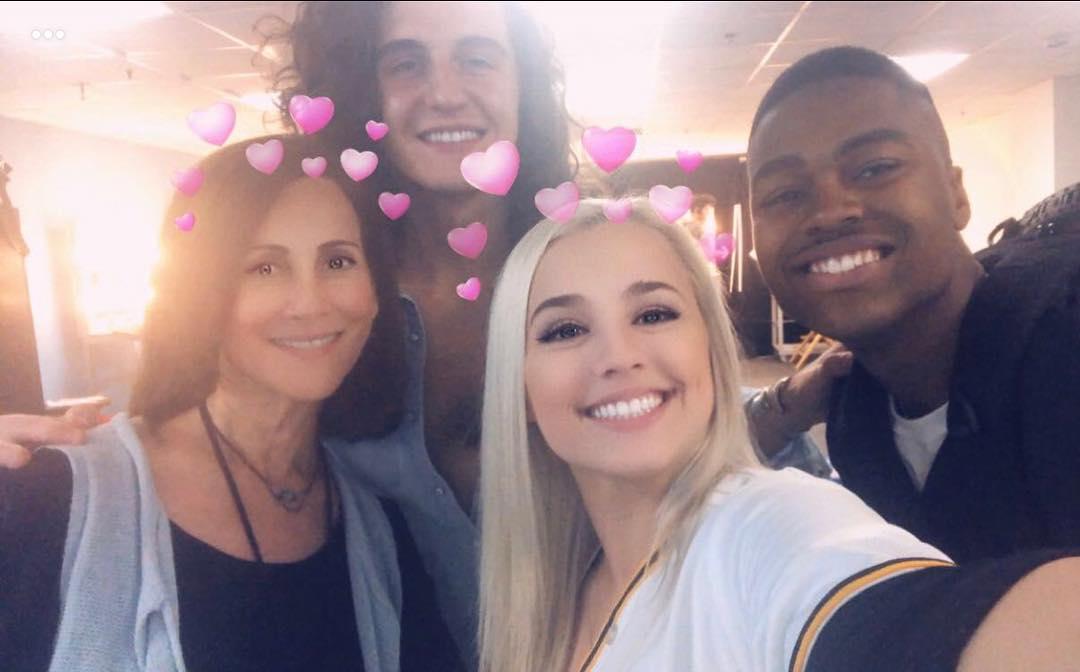 Robin Kaye surrounded by loved ones