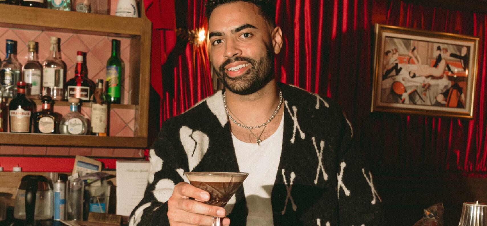 Justin Glaze holding espresso martini