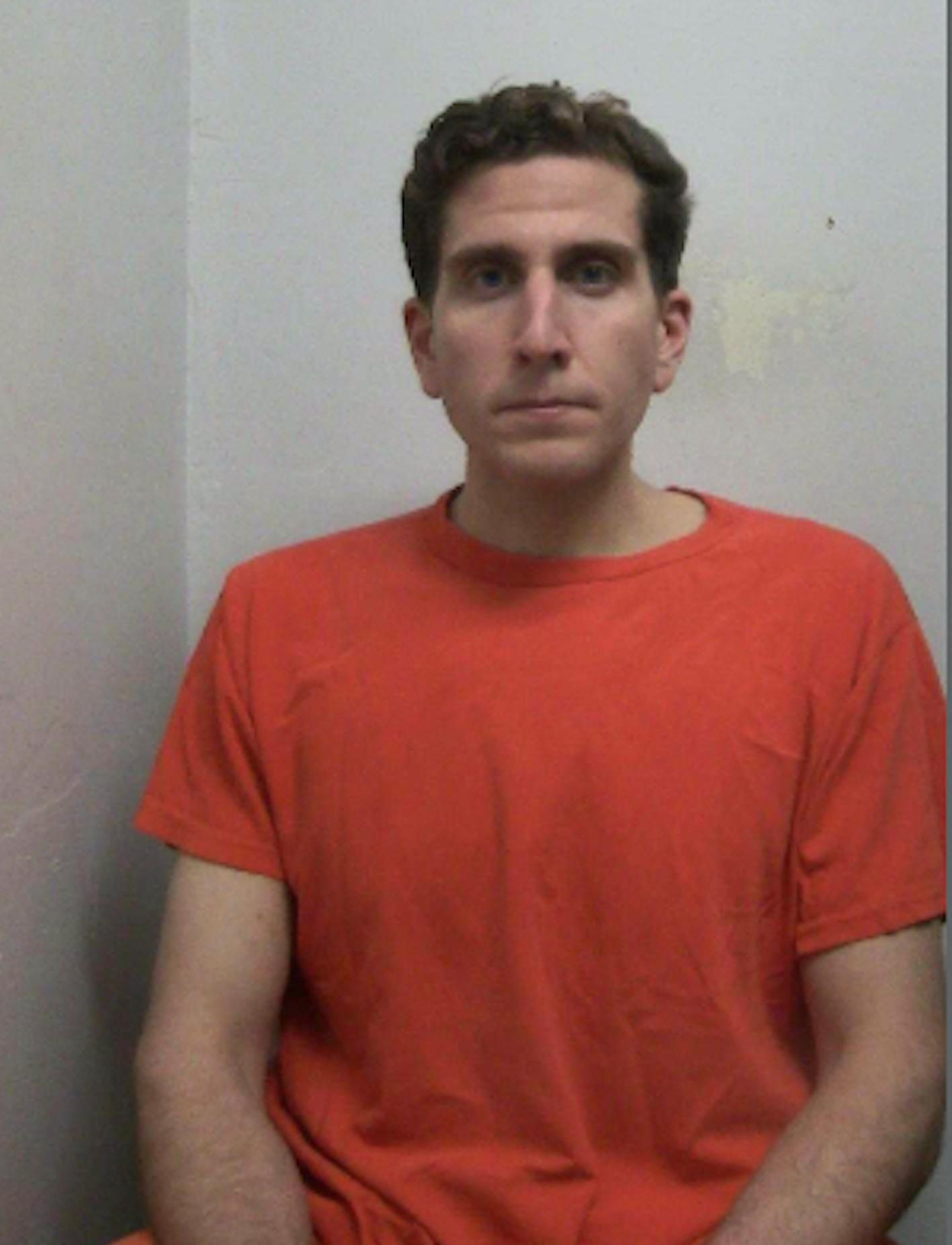 Quadruple murder suspect Bryan Kohberger appears in a new jail booking photo following his arrest.