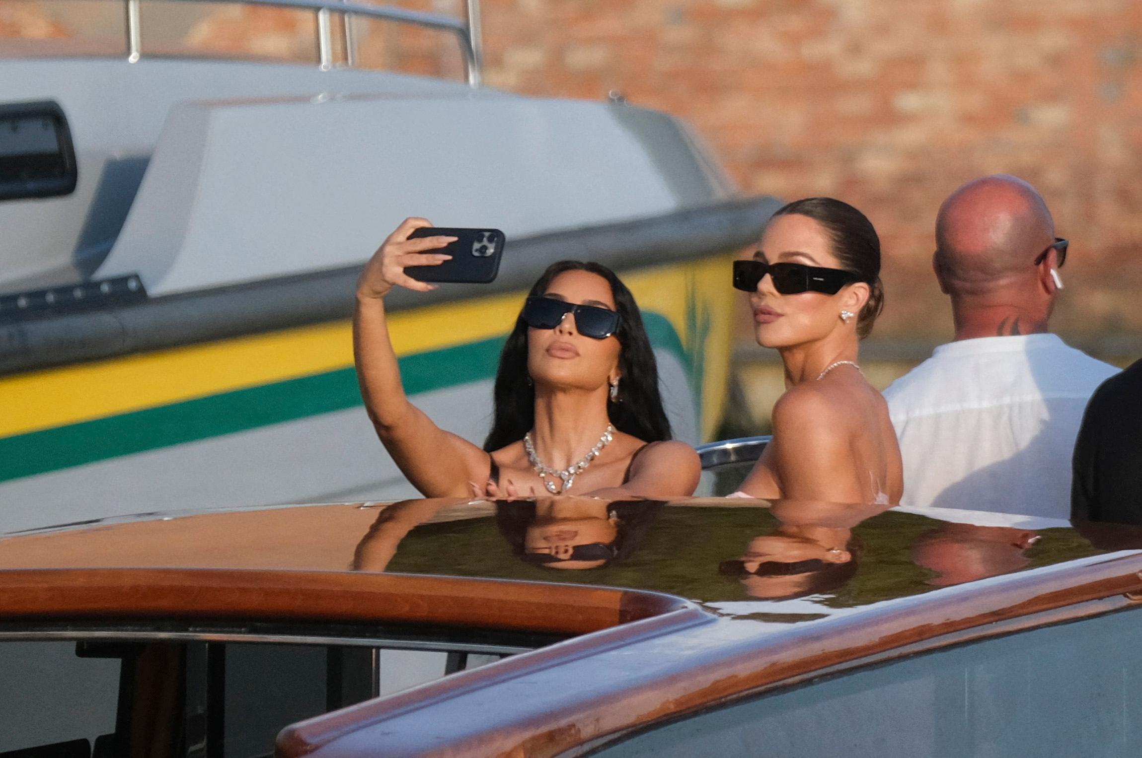 Kim and Khloè Kardashian heading to Bezos' wedding in Venice.