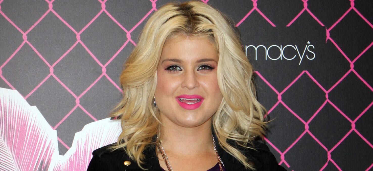 Kelly Osbourne wearing a short skirt appears as the Material Girl spokesperson at Macy's Dadeland
