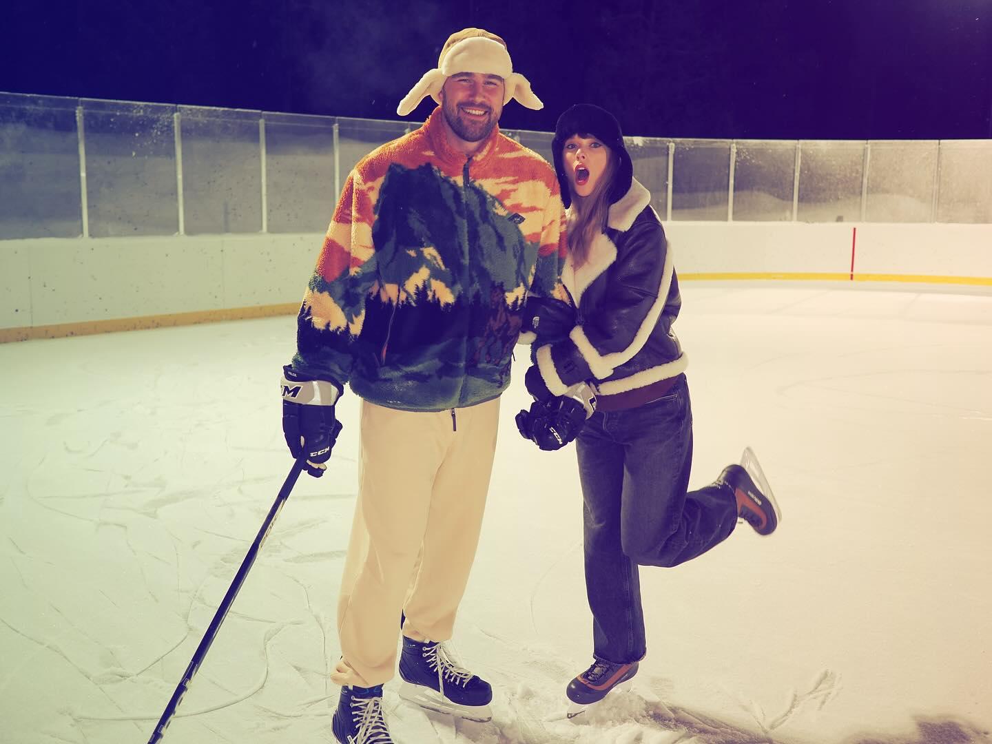 Travis Kelce poses with Taylor Swift