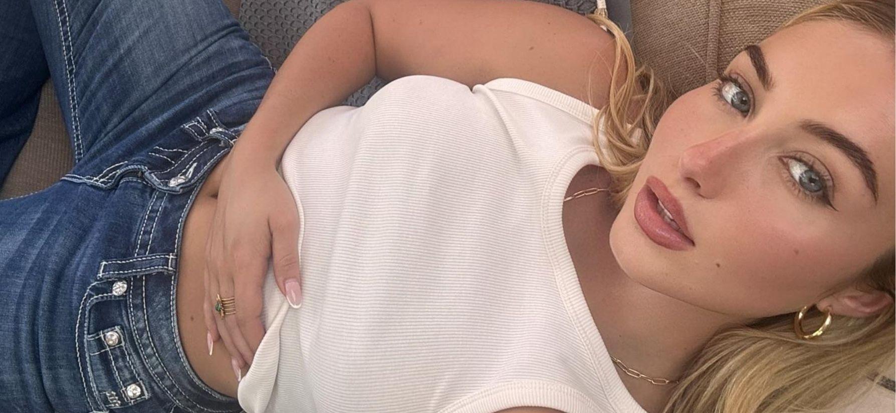 Heloise Huthart in white top and blue jeans