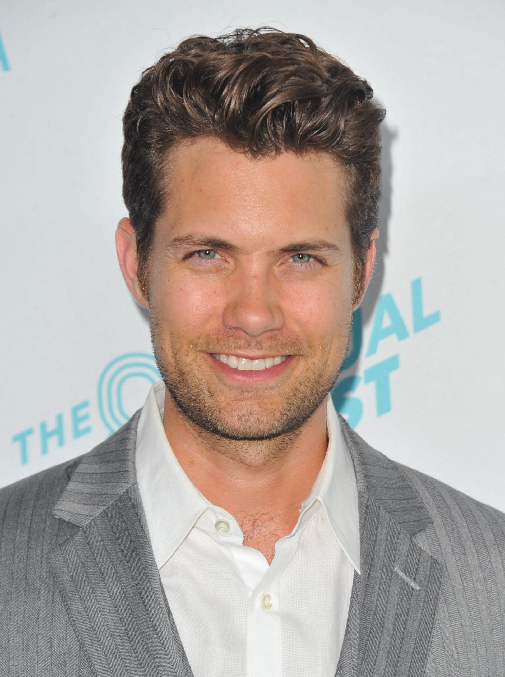 Drew Seeley posing on the red carpet.