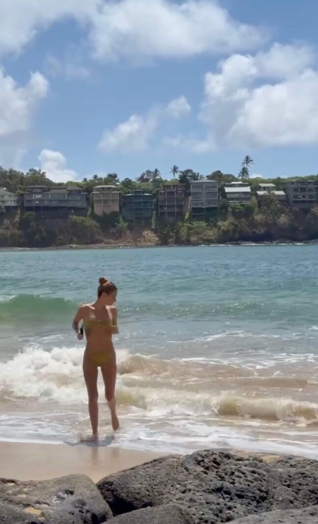 Dixie D'Amelio running on beach