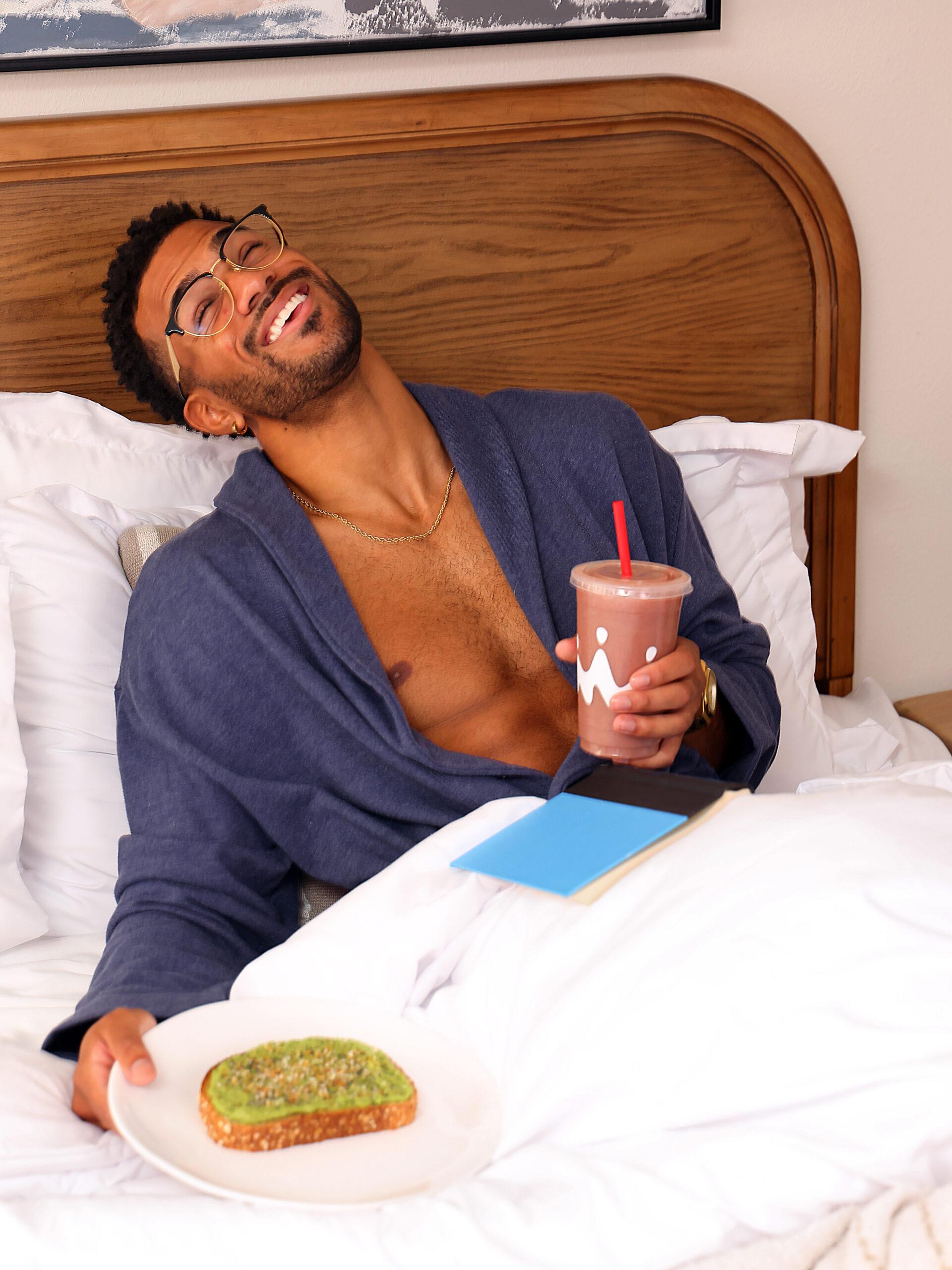 Jeremiah Brown with smoothie and avocado toast