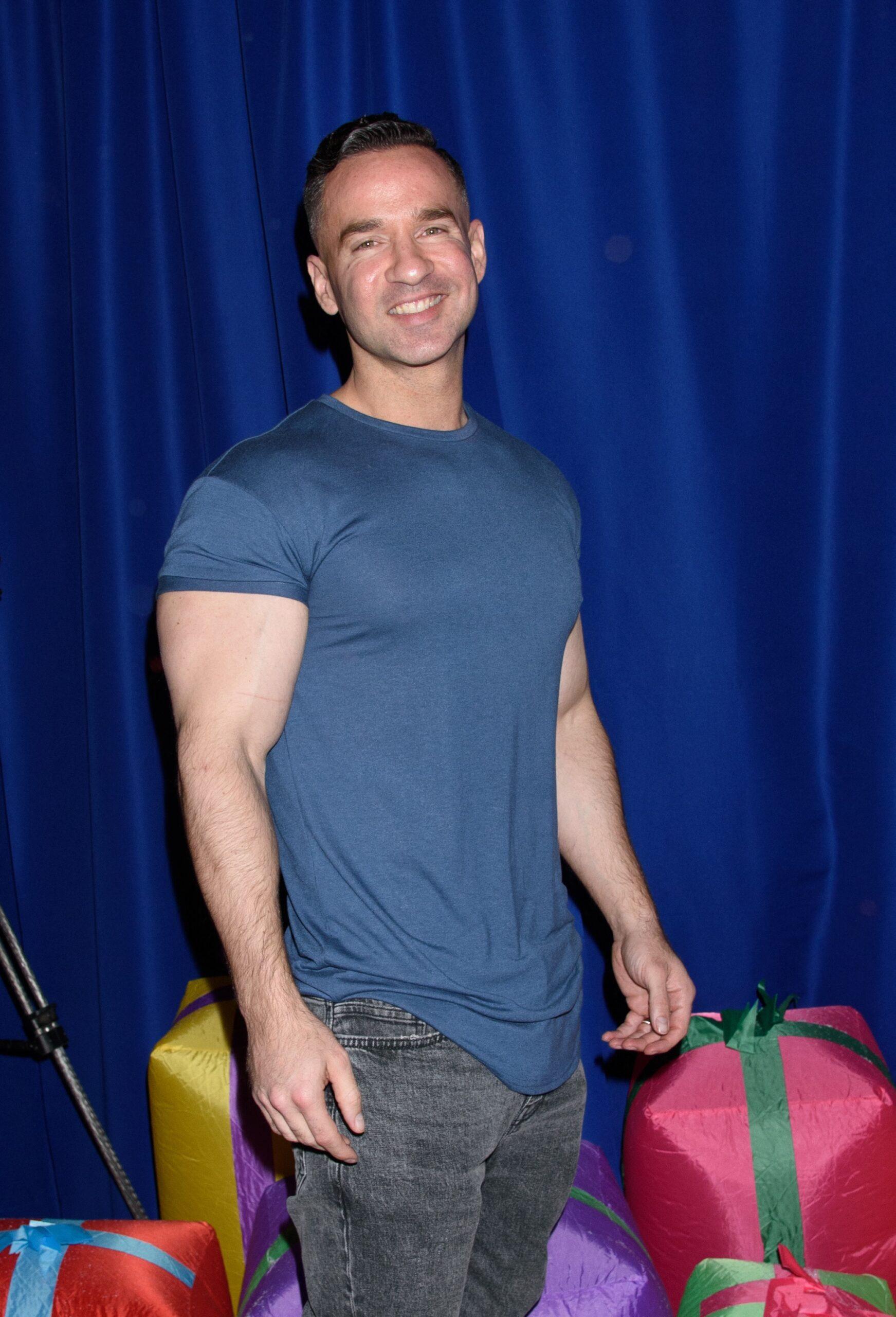 Mike Sorrentino posing on the red carpet.