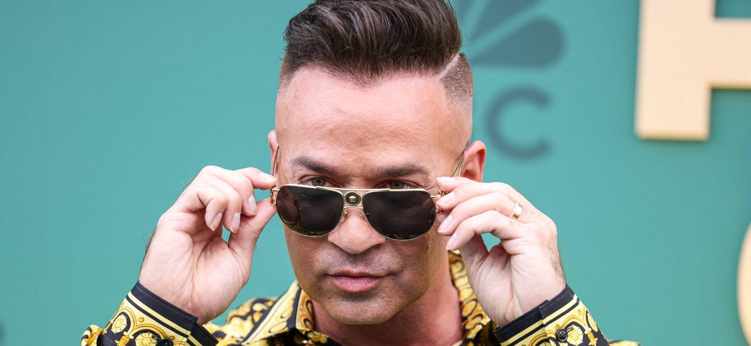 Mike "The Situation" posing on the red carpet.