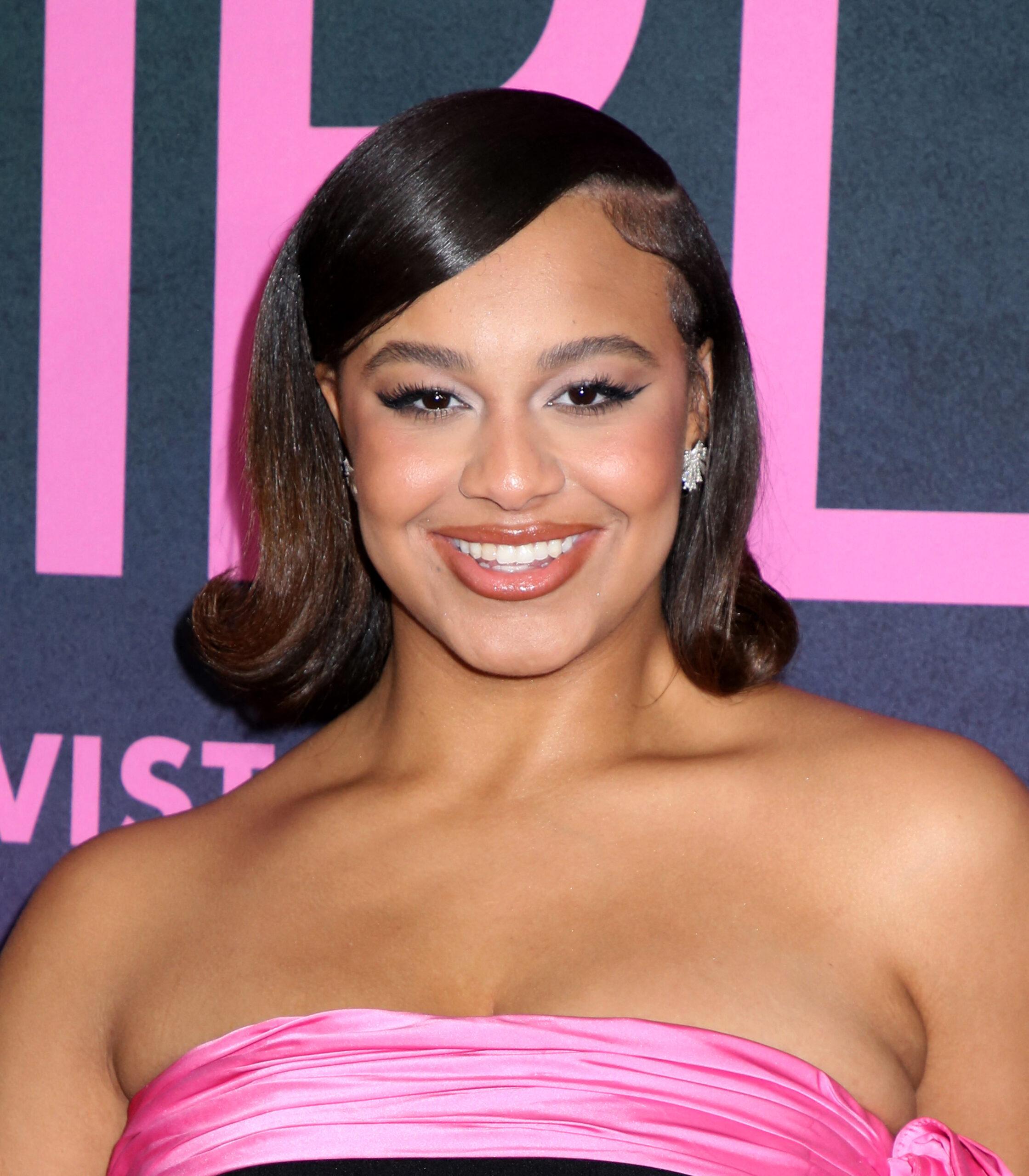 Nia Sioux posing on the red carpet. 