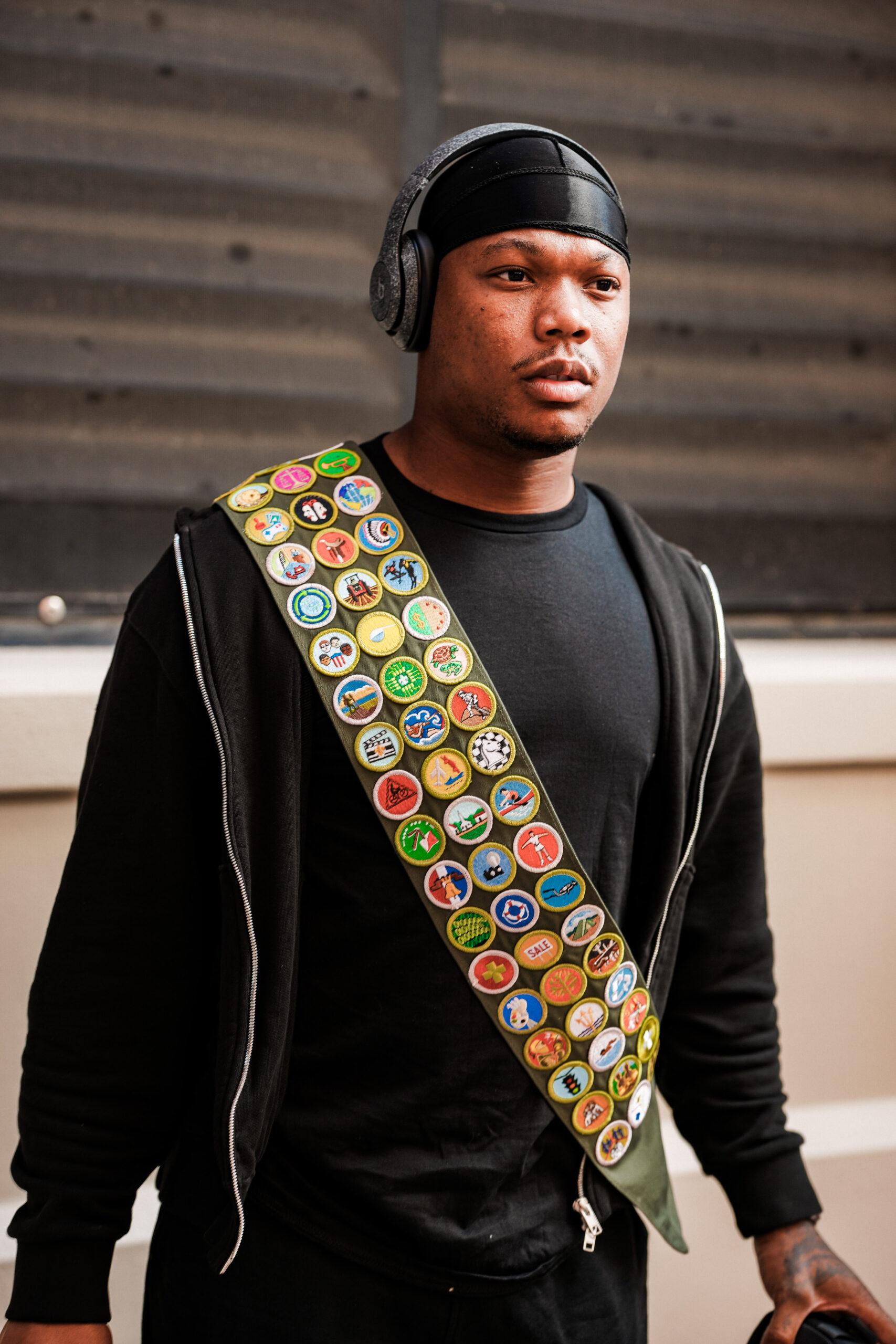 Detroit Lions running back and Eagle Scout David Montgomery honors his Scouting America background by incorporating the organization’s sash into his game day fit at Ford Field on September 28.