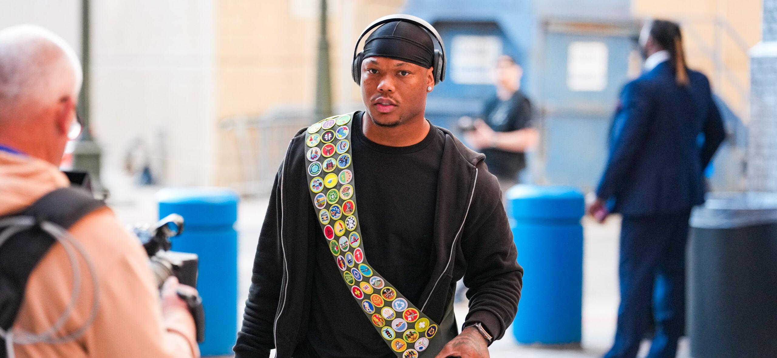 Detroit Lions running back and Eagle Scout David Montgomery honors his Scouting America background by incorporating the organization’s sash into his game day fit at Ford Field on September 28.