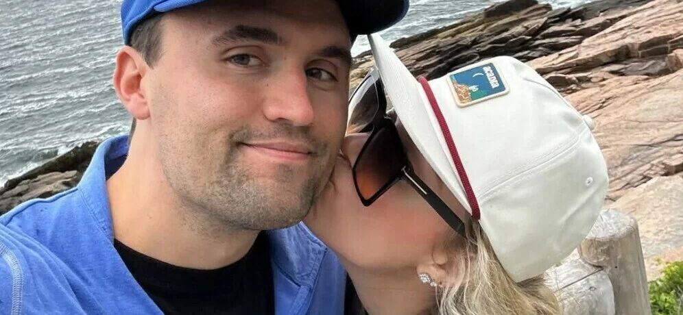 Erika Kirk kissing Charlie Kirk on cheek