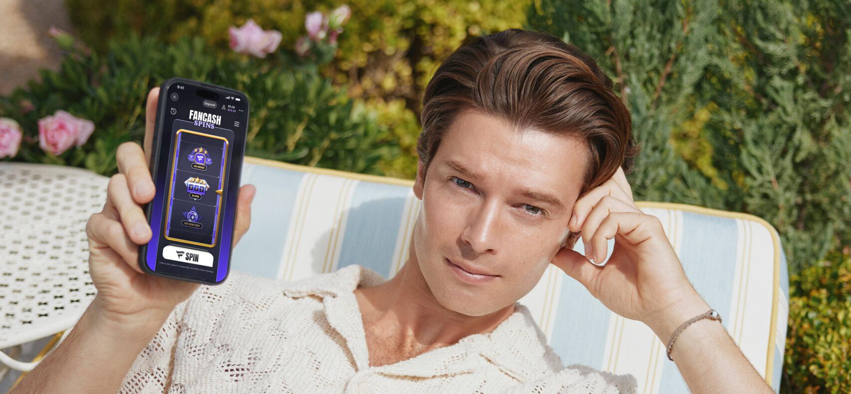 Patrick S. posing with a phone.