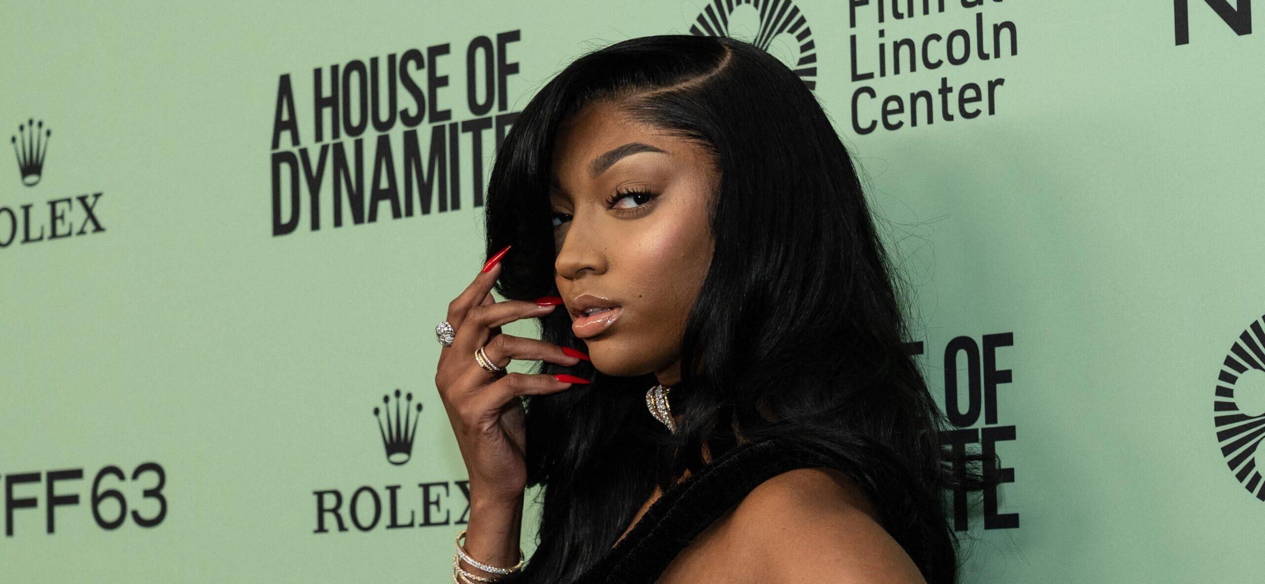 Angel Reese posing on the red carpet.