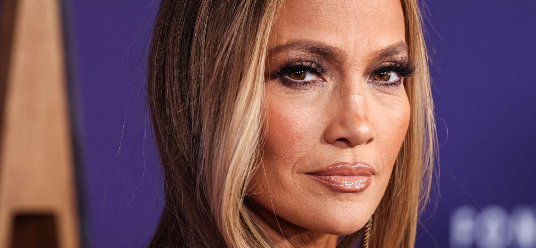 Jennifer Lopez wearing Defaience poses at the 2025 American Music Awards