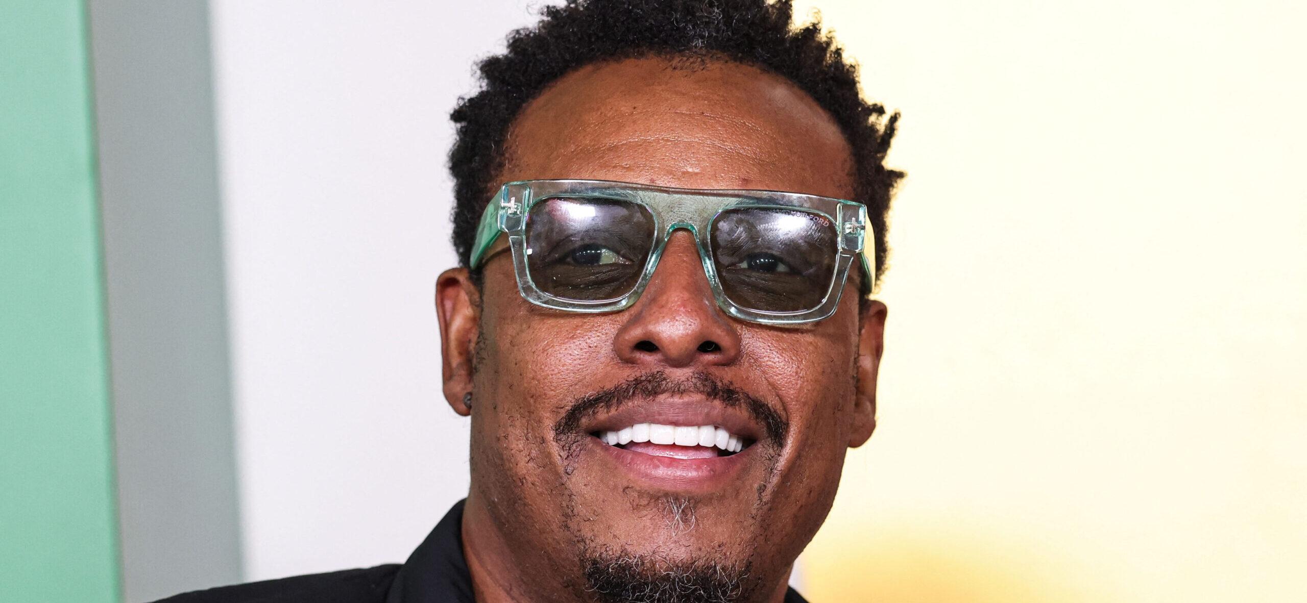 NBA star Paul Pierce posing on the red carpet.