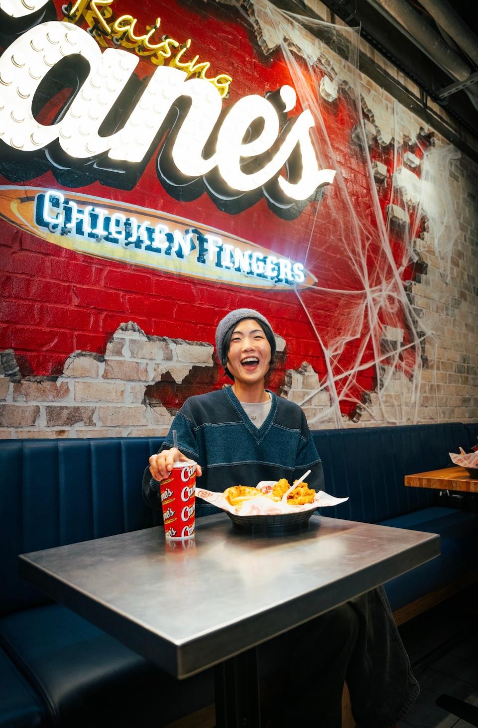 May Hong during a surprise “shift” at Raising Cane’s Times Square Global Flagship