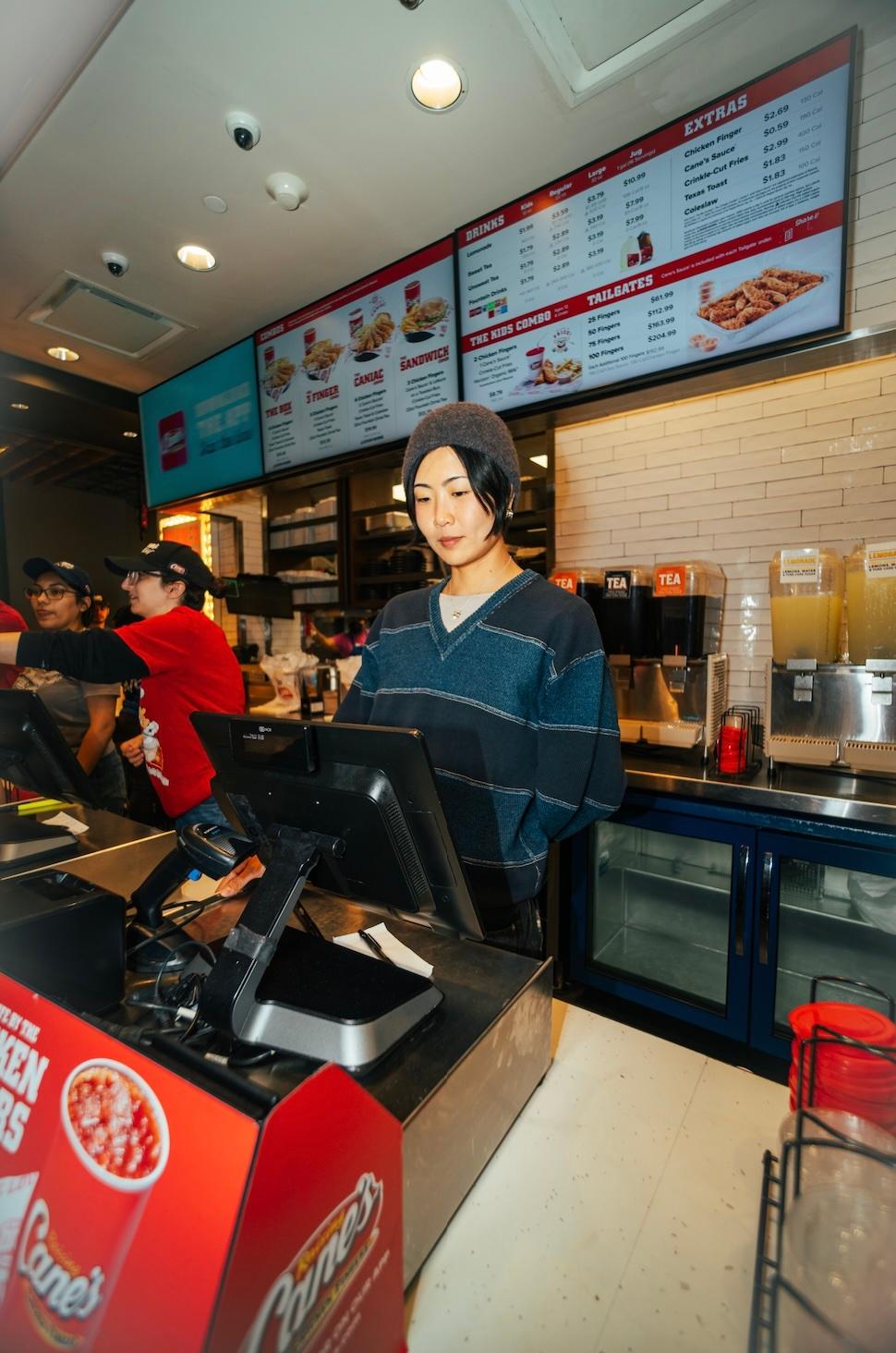 May Hong during a surprise “shift” at Raising Cane’s Times Square Global Flagship