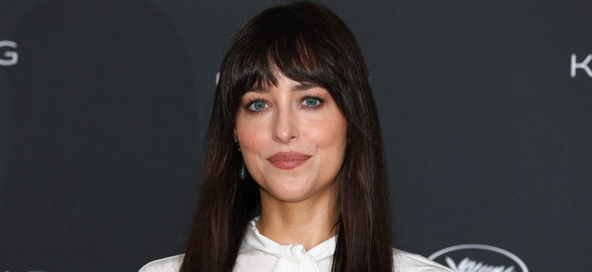 Dakota Johnson poses during Cannes 2025 photocall
