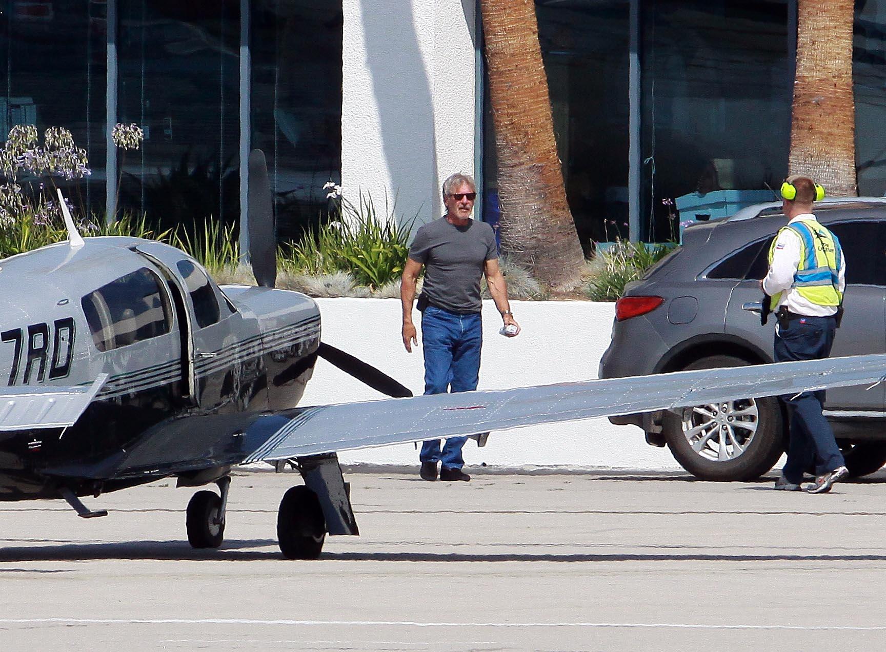 HARRISON FORD AT SANTA MONICA AIRPORT ON A PLANE