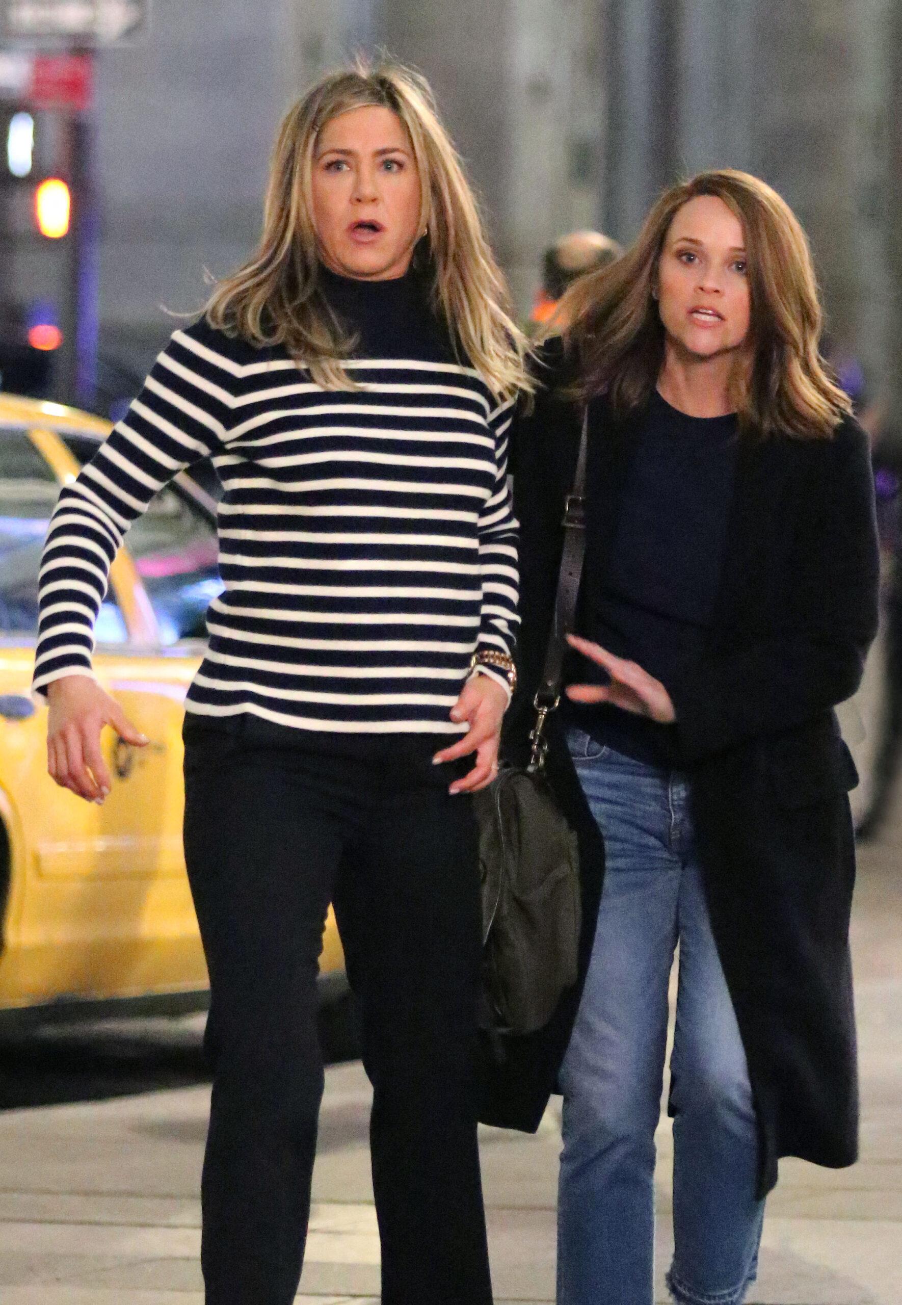 Jennifer Aniston and Reese Witherspoon filming "THE MORNING SHOW" in New York City.
