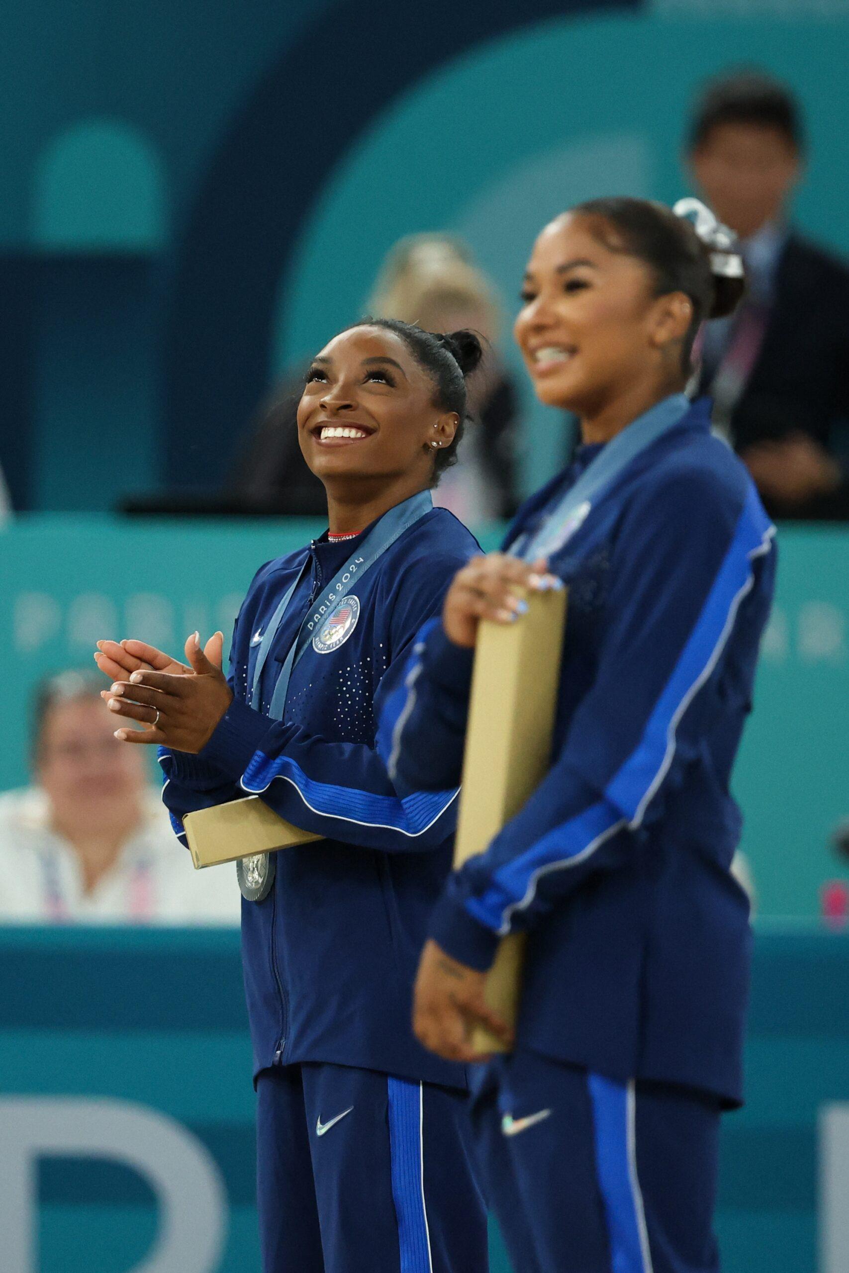 Jordan Chiles and Simone Biles on podium at 2024 Paris Olympics