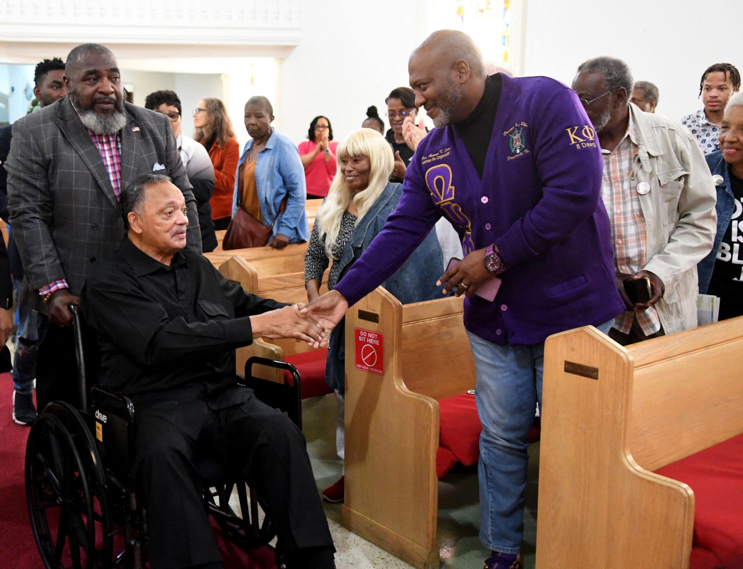 Rev. Jesse Jackson meeting people in Wisconsin